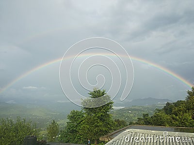 Natural rainbow shows natural beauty Stock Photo