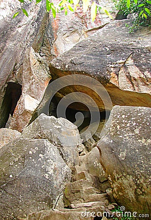 A Natural Rock Cave with Steps - Edakkal Caves in Wayanad, Kerala, India Stock Photo