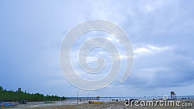 Natural Scenery Of Blue-gray Sky With Wide Expanse Of Beach Sand Stock Photo