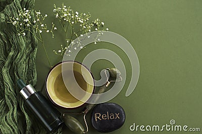 Natural Serum and oil for massage green background Stock Photo