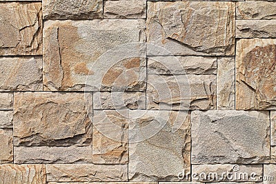 Natural shale. A sample of the wall covering with natural stone. Background. Stock Photo