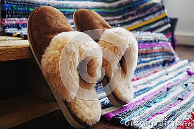 Natural sheepskin slippers for women Stock Photo