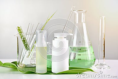 Natural skin care, Green herbal organic beauty product discovery at science lab Stock Photo