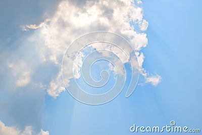 Natural soft clouds pattern and sunshine ray on blue sky background Stock Photo