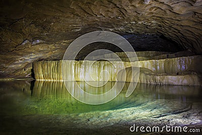 Natural speleothem, cascades of lakes and waterfalls in Nizhneshakuranskaya cave Stock Photo