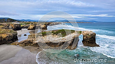 Natural stone arch on Playa de Las Catedrales, Spain Stock Photo