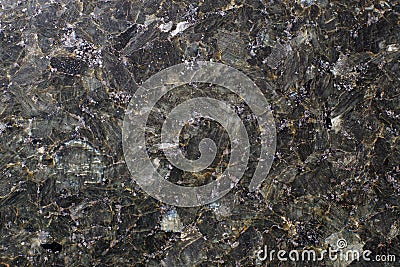 Natural stone gray granite, consisting as if of mica plates Stock Photo