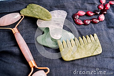 Natural stone gua sha tools for facial acupuncture massage Stock Photo