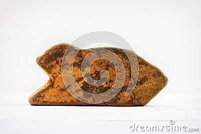 Natural stone shaped arrow pointer on white background mock up for text Stock Photo