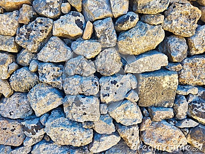 Natural stone slice texture background. Stone wall background texture - vintage. Colorful pebbles stones texture background. Home Stock Photo