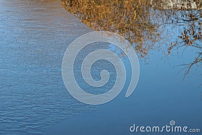 texture of lake and blue water with pieces of gray ice Stock Photo