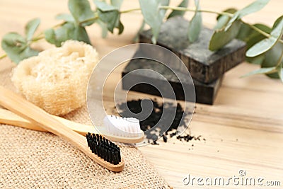 Natural toothbrushes made with bamboo on table Stock Photo