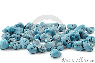 Natural turquoise beads on a white background Stock Photo