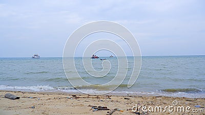 Natural View Of A Tropical Beach With Calm Sea Waves Stock Photo