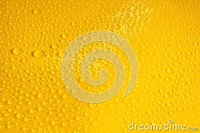 natural water drops on yellow background texture Stock Photo