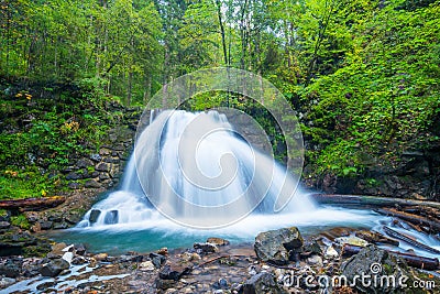 Waterfall in a Bavarian forest Stock Photo