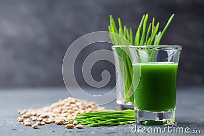 Natural wheat grass juice. Detox, diet and superfood concept. Stock Photo