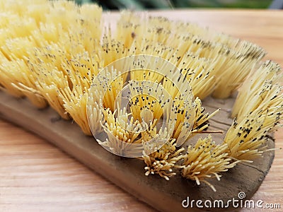 Natural wooden brush scub for clothes Stock Photo