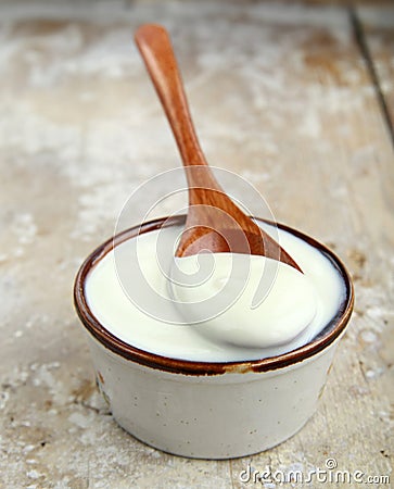 natural yogurt, sour cream in a ceramic Stock Photo