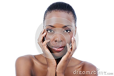 Naturally alluring. Portrait of a smiling woman against an isolated background. Stock Photo