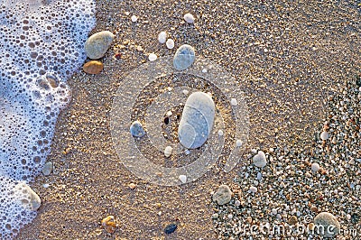 Naturally rounded gravel at sea shore, nature sea background tex Stock Photo