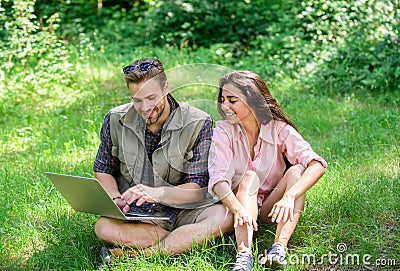 Nature best workspace. Couple youth spend leisure outdoors with laptop. Modern technologies give opportunity to be Stock Photo