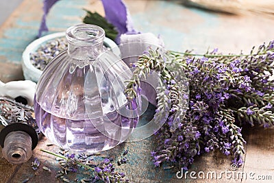 Nature cosmetics, handmade preparation of essential oils, parfums, creams, soaps from fresh and dried lavender flowers, French ar Stock Photo