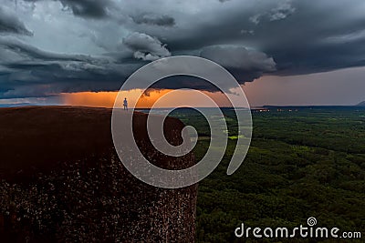 Nature force background - bright lightning in dark stormy sky in Mekong River of Tree rock Whale Mountain in Bungkan Stock Photo