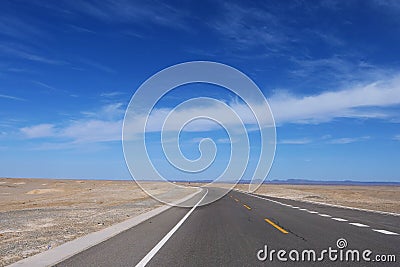 Nature landscape view of high way road under sunny blue sky in Dunhuang Gansu China Stock Photo