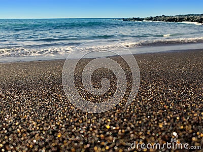 Nature`s jewelry in action on the black sand beach of Canary Islands Stock Photo