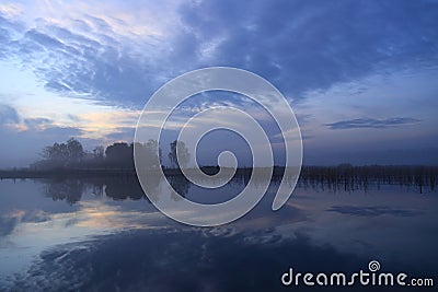 Nature early morning sunrise blue sky and clouds gelderland Stock Photo