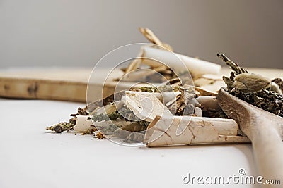 Naturopath healthcare with various raw organic herbs Stock Photo