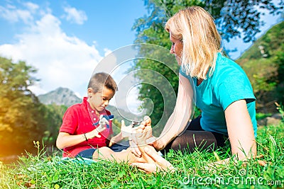 Naturopath practicing reflexology at the foot of a child Stock Photo