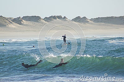 Nautic sports in Baleal, Portugal: bodyboard and paddle surfing Editorial Stock Photo