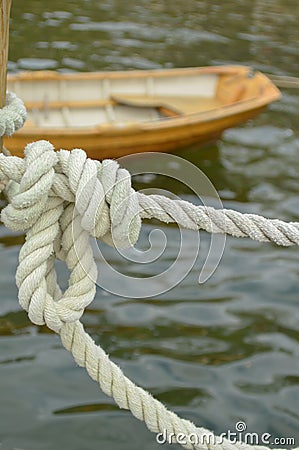 Nautical Knot and Brown Boat Stock Photo