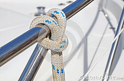 Nautical part of a yacht with cords, rigging, sail, mast, anchor, knots . Stock Photo