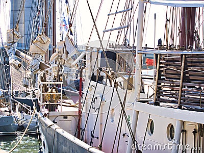 Nautical tackles and equipment of the old tall ship. Rigging ropes and rope ladder on the mast of sailing vessel Editorial Stock Photo