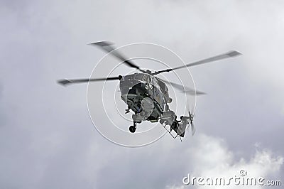 Naval helicopter on training mission Stock Photo