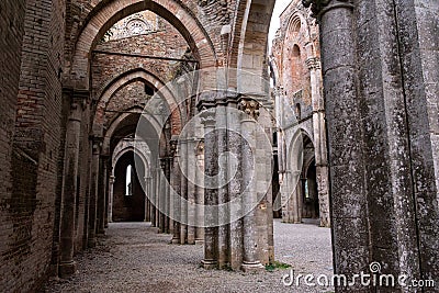 Nave of the ruined and abandoned Cistercian monastery San Galgano in the Tuscany Editorial Stock Photo