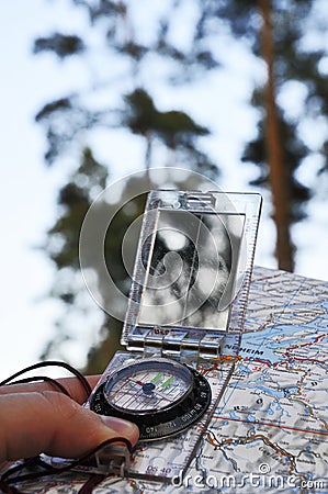 Navigating with compass Stock Photo