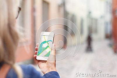 Navigation app on the mobile phone. Stock Photo