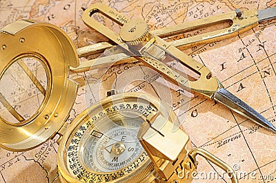 Navigation device on a background an old map Stock Photo