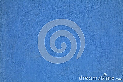 Navy blue or sapphirine wall, texture, background. The building wall, painted with water-based paint Stock Photo