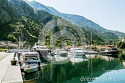 Navy Pier with yachts in the town of Kotor Stock Photo