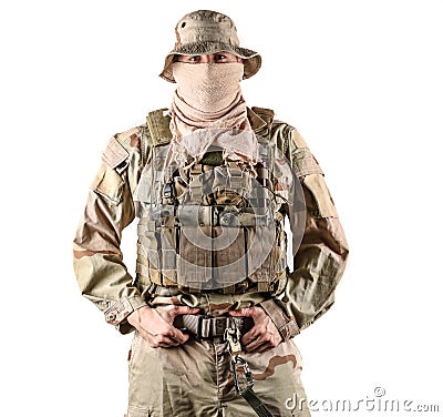 Navy seal specialist in combat gear with his hands on his belt posing in front of camera Stock Photo