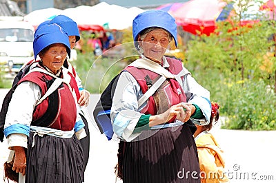 Naxi women in Lijiang Editorial Stock Photo