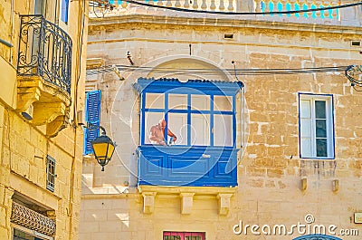 The repairing the old balcony in Naxxar town, Malta Editorial Stock Photo