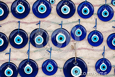 Nazar bonjuk, bead from evil eye, an amulet of Fatima`s blue eye, souvenir hanging lot are sold on market Stock Photo
