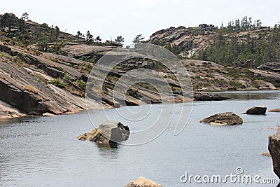 Near Ezaro river waterfal. Sea. Rocks. Landscape Stock Photo