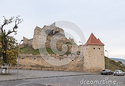 Fragment of the fortress wall of the Rupea Citadel built in the 14th century on the road between Sighisoara and Brasov in Romania Editorial Stock Photo